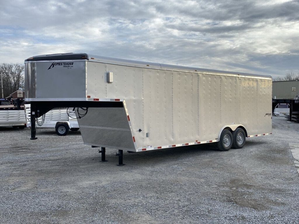 8.5' X 32' Hercules Homesteader gooseneck enclosed trailer on our lot. 