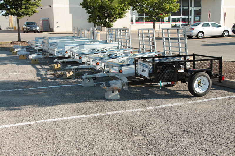 Trailers for sale on a lot when deciding how to choose a trailer.